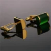 unique cufflinks gold and green side view